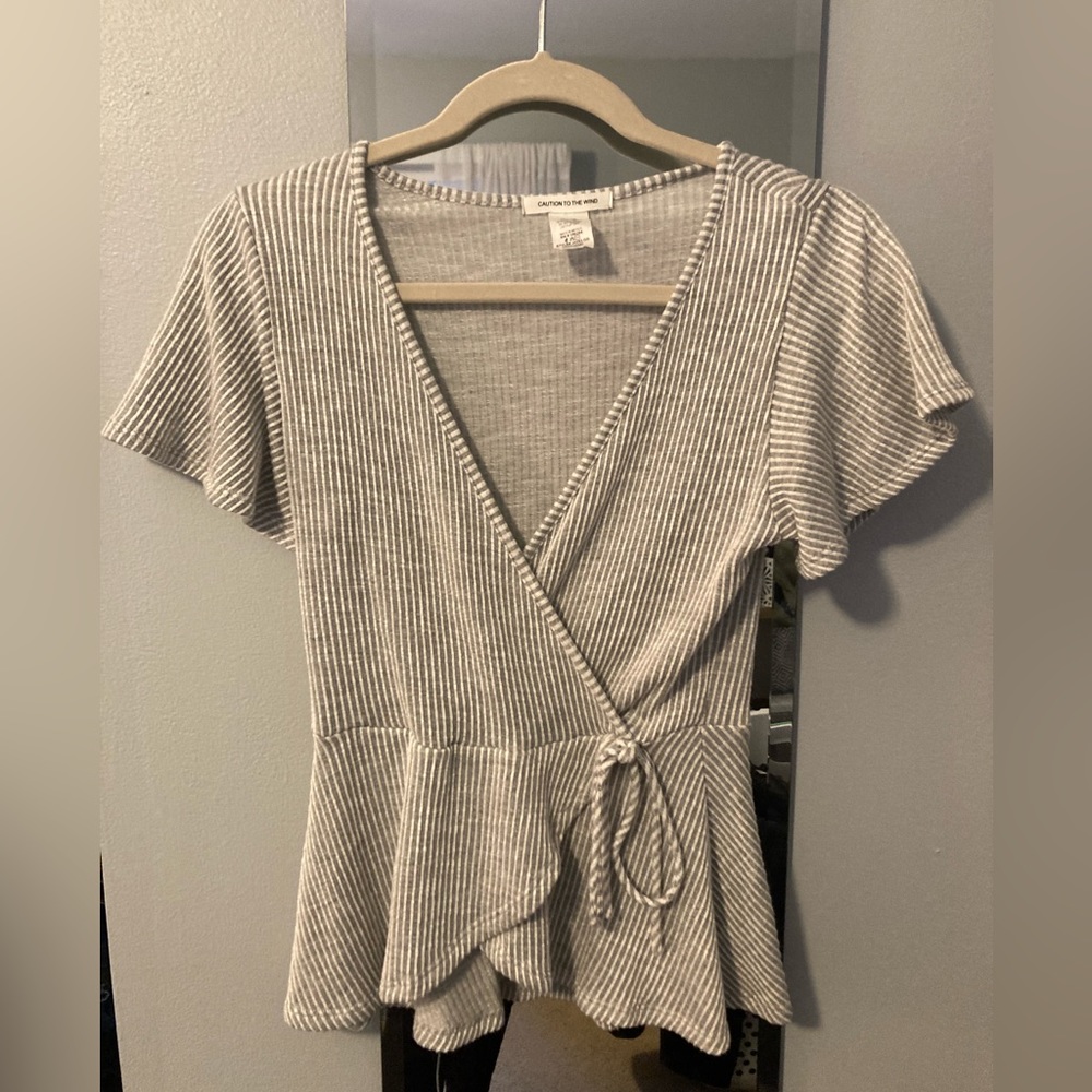 Caution to the wind Grey & white striped flattering short sleeve top